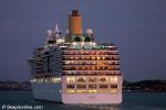 ID 6753 ARCADIA (2005/83781grt/IMO 9226906) sails at sunset from Auckland, New Zealand following her second visit to the 